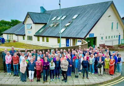 People who are learning welsh standing outside Pwllheli Colleg